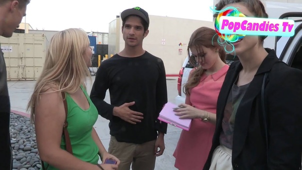 Tyler Posey with Holland Roden Crystal Reed Colton Haynes greets a fan at 2012
